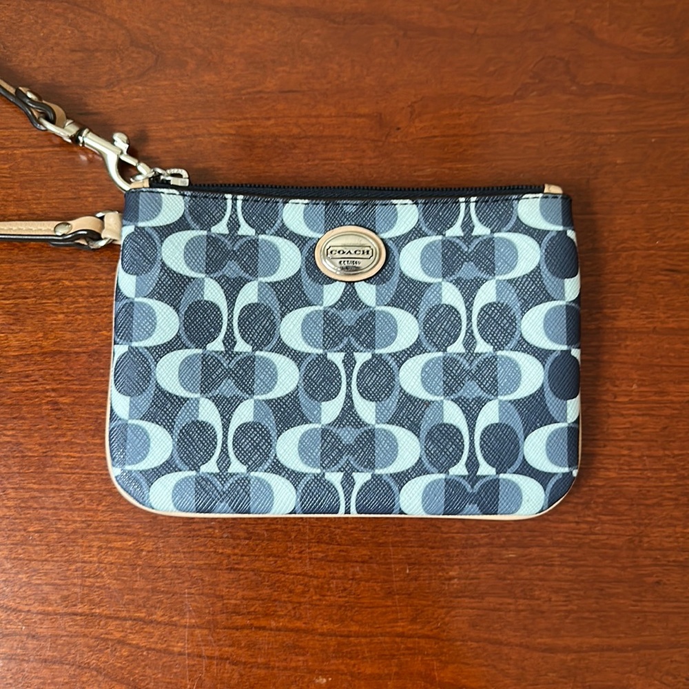Classic Coach monogram wristlet